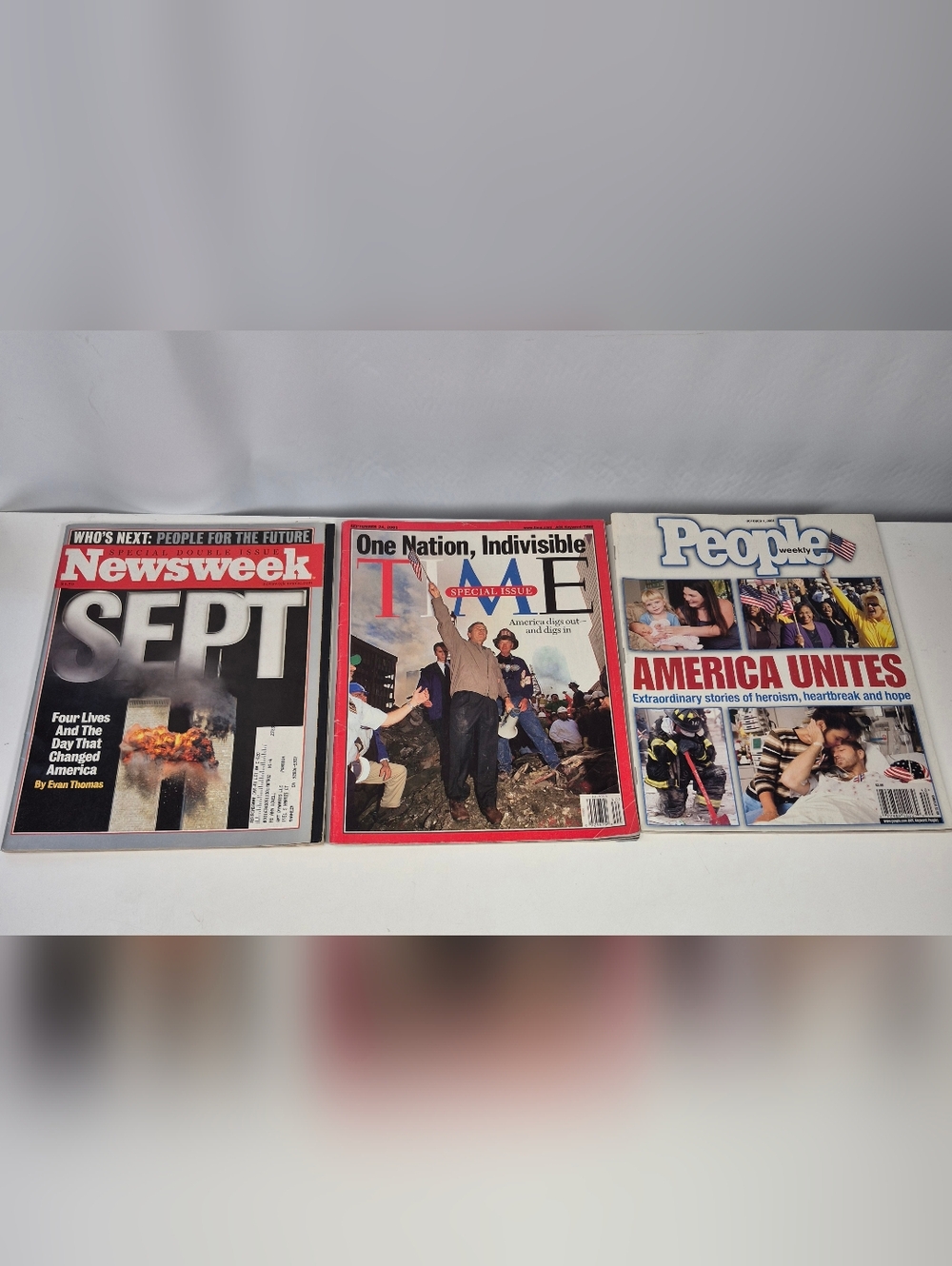 9/11  lot of 3 magazines includes issues from Time, People, and Newsweek.